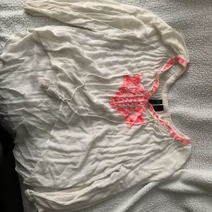 White blouse with pink embroidery